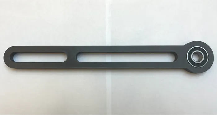 Slotted connecting lever with bearing eye